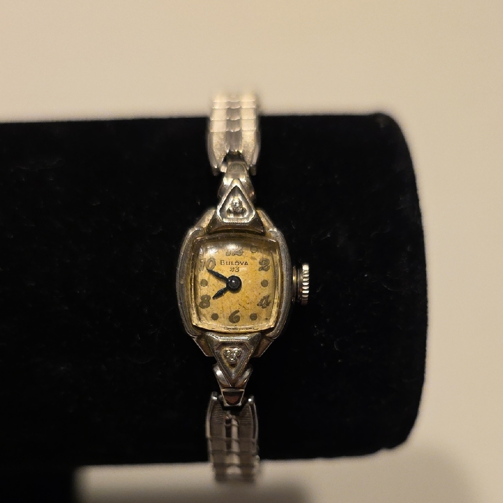 Vintage Bulova 23 Watch Marked 10KT Rolled Gold Plated Bulova L7, 2 Chip Diamond